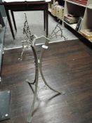An antique Arts and Crafts style Townshend & co brass companion set rack or holder