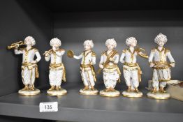 A set of German made porcelain figures of a West Indian marching band