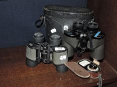 Two pairs of modern binoculars including Swift 10x50 with leather case