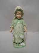 A Victorian German bisque figure by Gebruder Heubach of a girl with skipping rope 17inch tall