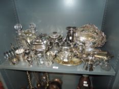 A good selection of early 20th century silver plated table wares including Silver cup, silver lidded