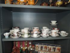 A selection of antique and later tea cup and saucer sets including Worcester Chamberlain, Lustre and