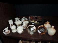 A selection of crested wares with two Caithness paper weights etc