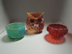 A selection of modern art glass including owl form vase, footed cranberry dish and Mdina glass bowl