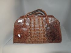 An Art Deco era Aligator skin hand bag