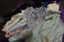 A mixed lot of lingerie including nylon peignoirs and bed jackets, silk tap pants, slips, bras and