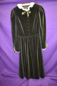 A collectable late 1970s Gina Fratini dark green velvet dress, having self covered buttons to