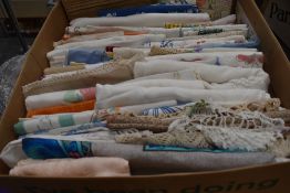 A box full of vintage and antique table linen (and a few huckaback towels) some with embroidery,