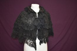An unusual and intricate Victorian cape using a range of techniques throughout such as tatting,