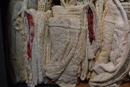 A collection of vintage and antique net curtains, crochet work and other similar items.