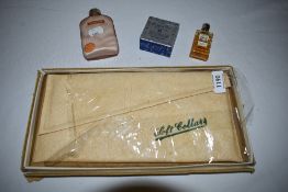 An unopened Bourjois wartime pack of Evening in Paris powder, a soft collar case and two vintage
