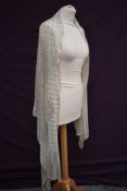 A 1920s cream cotton Tulle Bi Telli shawl.