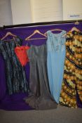 A mixed lot of vintage clothing to include psychedelic 60s jump suit, 1950s iridescent dress,
