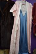A vintage kimono style dressing gown in pink cotton with white embroidery and a Nylon nightdress.