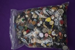Over one Kilogram of vintage and antique buttons.