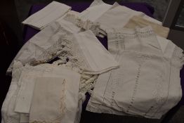 A mixed lot of vintage and antique table linen, some lovely drawn thread work table cloths amongst