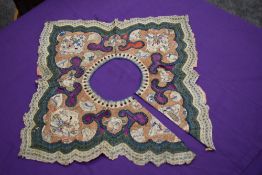 A Victorian Chinese embroidered collar, using silk thread on silk panels framed with gold thread,