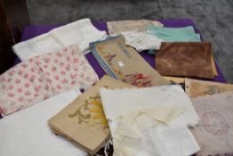 A lovely mixed lot of vintage nightdress and stocking holders, bags and collars etc.