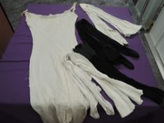 A ladies all in one 1900s undergarment and a collection of stockings.