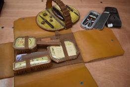 A collection of vintage 1930s and 1940s travel items, manicure items and wash cases, also included