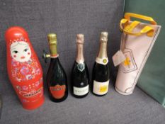 Three bottles of Champagne, Veuve Clique Ponsardin 12.5%, 750ml in cool bag, Chanoine Tsarine 12%