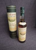 A bottle of Glenmorangie Single Highland Rare Malt Scotch Whisky, 18 Year Old 43% vol, 70cl in green