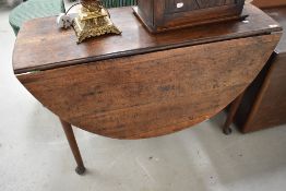 A 19th Century oak gateleg dining table
