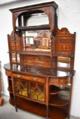 A 19th Century Sheraton style chiffonier sideboard having mirror back and extensive inlay