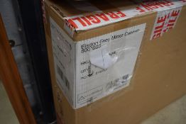 A boxed Elsdon mirror door bathroom cabinet from Victoria Plum