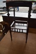 A Victorian mahogany occasional table having galleried undertier
