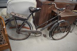 A vintage Holco cycles push bike.