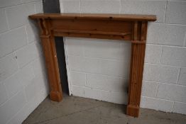 A natural pine fire surround