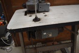 A vintage commercial singer sewing machine