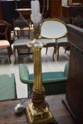 A vintage brass table lamp in classical style