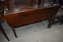 A Victorian mahogany pembroke style table