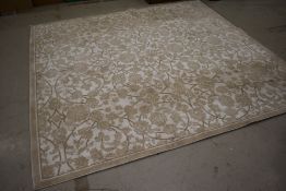 A modern carpet square/rug in light cream and white