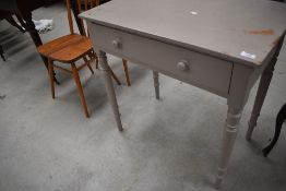 A Victorian painted pine side table