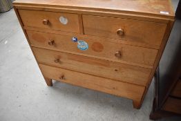 An early 20th Century Gomme style chest of two over three drawers