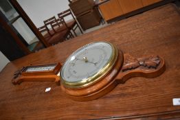A modern mahogany banjo style barometer