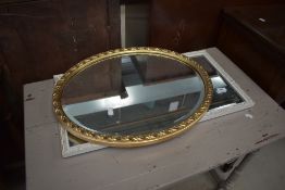 Two modern mirrors one oval and similar white painted frame