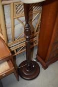 A traditional mahogany standard lamp