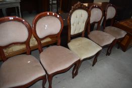 A 20th century dining chairs beech framed with cabriole legs and balloon backs