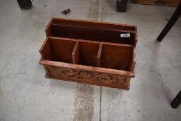 A hardwood stationery rack