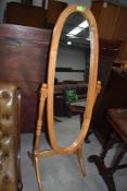 A modern beech cheval mirror