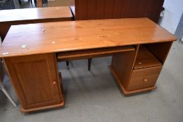 A large modern pine desk