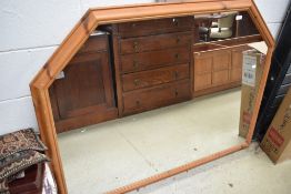A modern pine over mantel mirror