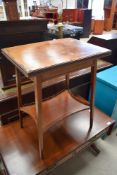 An Edwardian mahogany fold over occasional table