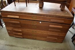 A traditional oak plan chest . Six drawers in two sections, labelled Masons arclight