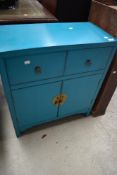 A modern Oriental style side cabinet, in Aquamarine