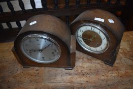 Two 20th century mantle clocks both having oak cases one by Anvil and similar Smiths